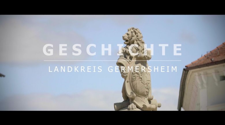 bild einer statue mit beschriftung "Geschichte" des Landkreises